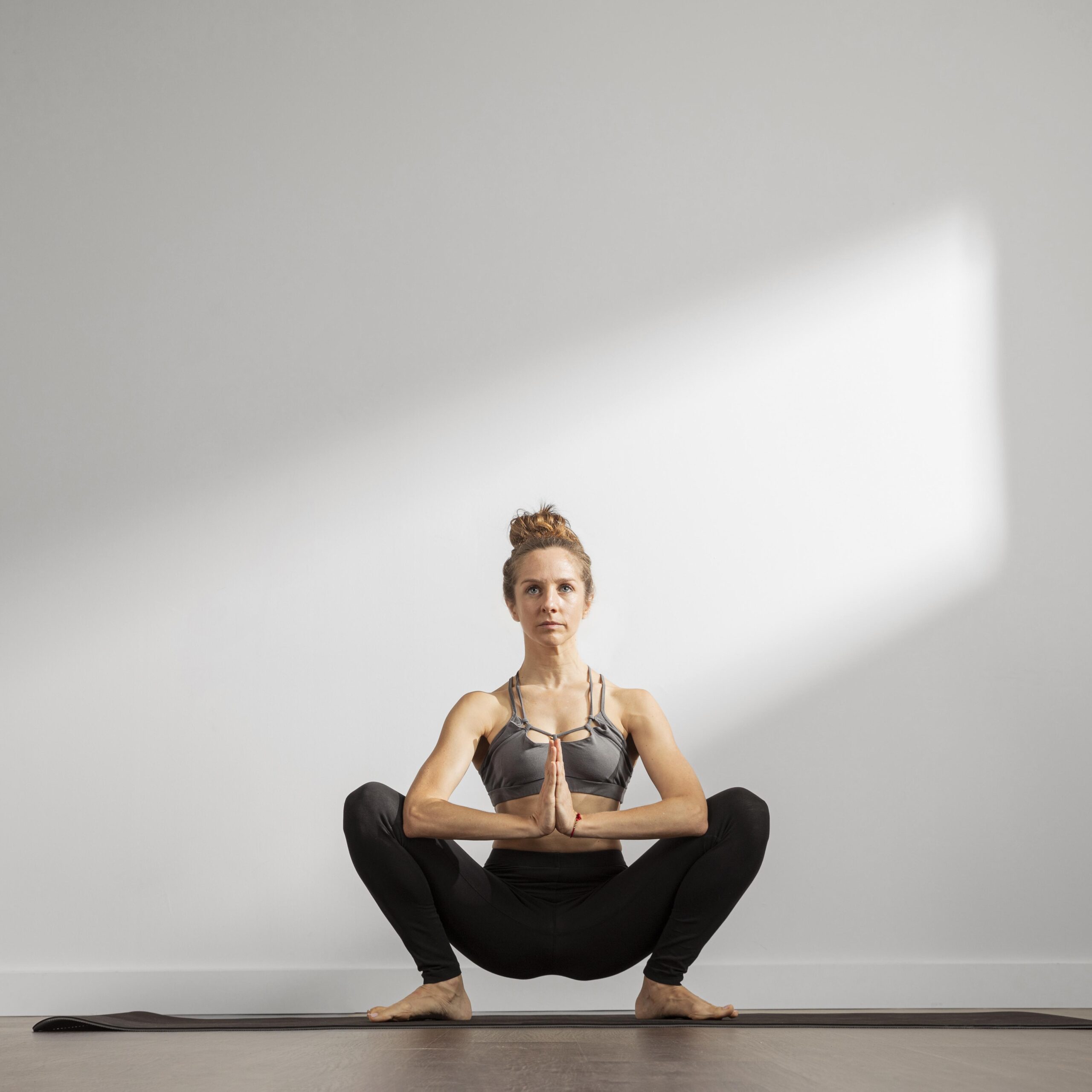 adult-woman-practicing-yoga-home (2)